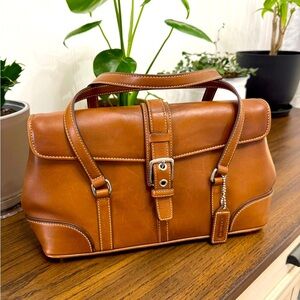 Coach Brown Mini Bag with Structured Design and Buckle Details